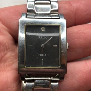 Relic Folio Wrist watch 30 meter/100 feet water resistant. Stainless steel.